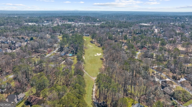 drone / aerial view featuring a forest view