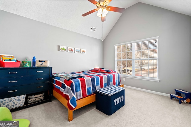 carpeted bedroom featuring visible vents, baseboards, high vaulted ceiling, and ceiling fan