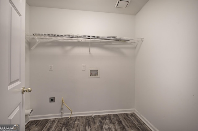 clothes washing area with visible vents, dark wood finished floors, hookup for an electric dryer, hookup for a washing machine, and laundry area