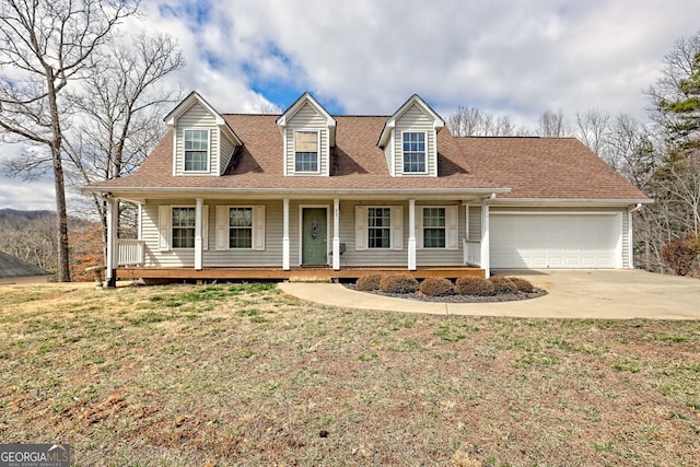95 Volunteer Ln, Murphy, NC 28906 - cape cod house featuring a porch, concrete driveway, an attached garage, and a shingled roof