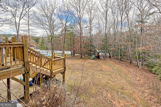 95 Volunteer Ln, Murphy, NC 28906 - view of yard with a deck and a playground