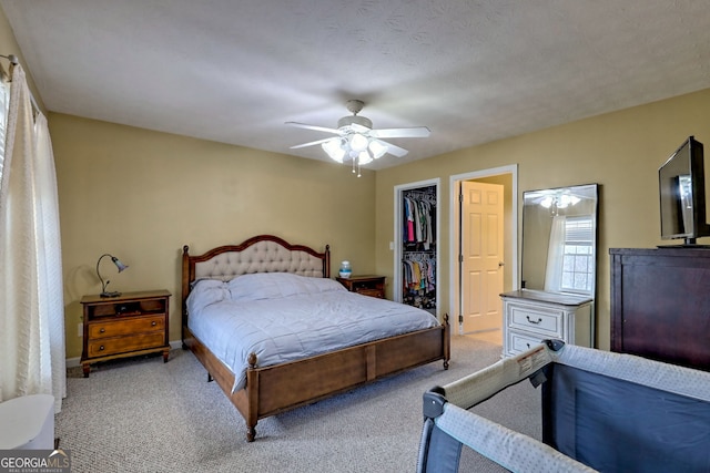 95 Volunteer Ln, Murphy, NC 28906 - carpeted bedroom with a closet, baseboards, a walk in closet, and ceiling fan