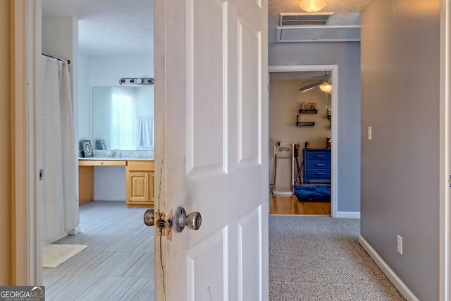 95 Volunteer Ln, Murphy, NC 28906 - hall with visible vents, baseboards, and light colored carpet