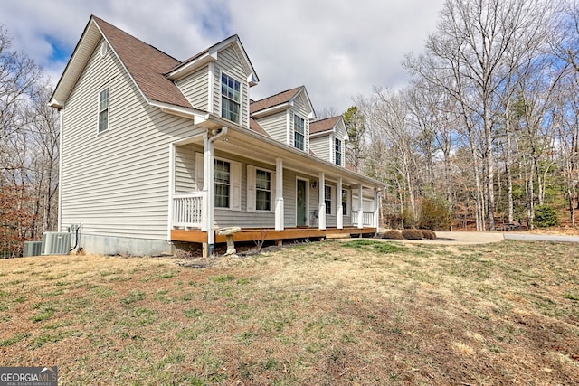 95 Volunteer Ln, Murphy, NC 28906 - view of home's exterior featuring central AC unit, a lawn, and covered porch