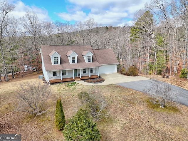 95 Volunteer Ln, Murphy, NC 28906 - cape cod house with an outbuilding, covered porch, driveway, and a forest view