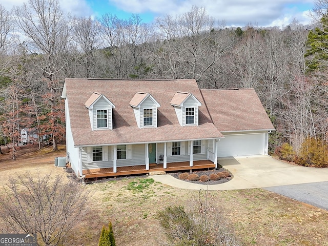 95 Volunteer Ln, Murphy, NC 28906 - cape cod home with central air condition unit, driveway, a forest view, covered porch, and a garage
