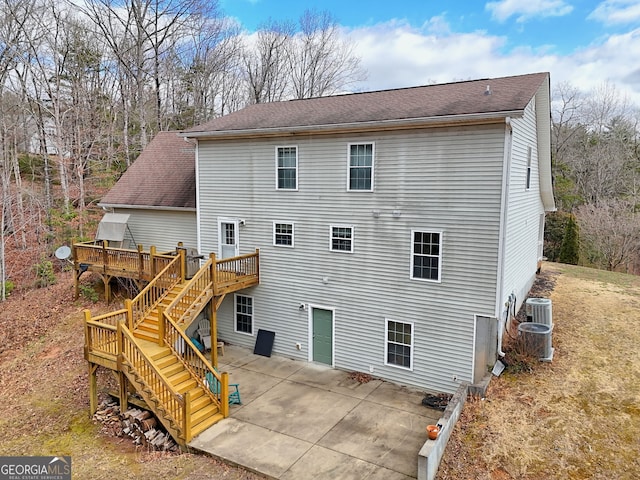95 Volunteer Ln, Murphy, NC 28906 - back of property with a patio, stairway, central AC unit, roof with shingles, and a wooden deck