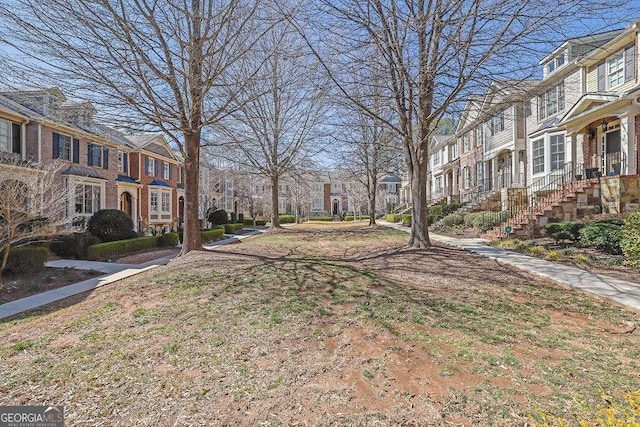 view of yard featuring a residential view