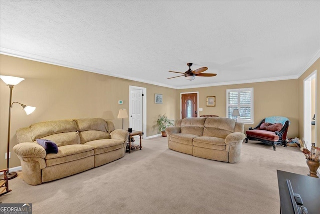 25 Wesley Trce SE, Cartersville, GA 30120 - carpeted living room featuring ceiling fan, a textured ceiling, baseboards, and ornamental molding