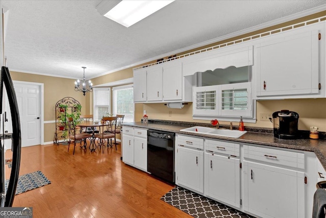 25 Wesley Trce SE, Cartersville, GA 30120 - kitchen with ornamental molding, a sink, black dishwasher, dark countertops, and light wood-type flooring
