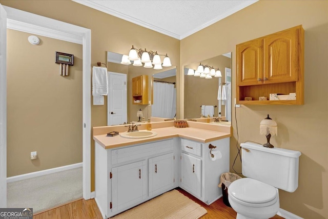 25 Wesley Trce SE, Cartersville, GA 30120 - full bathroom featuring vanity, wood finished floors, baseboards, and ornamental molding