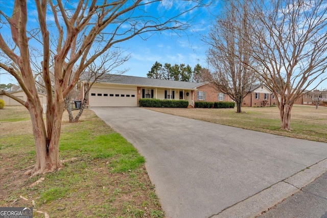 25 Wesley Trce SE, Cartersville, GA 30120 - single story home with brick siding, a front lawn, concrete driveway, and an attached garage
