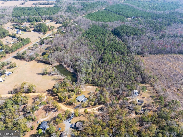 aerial view with a wooded view