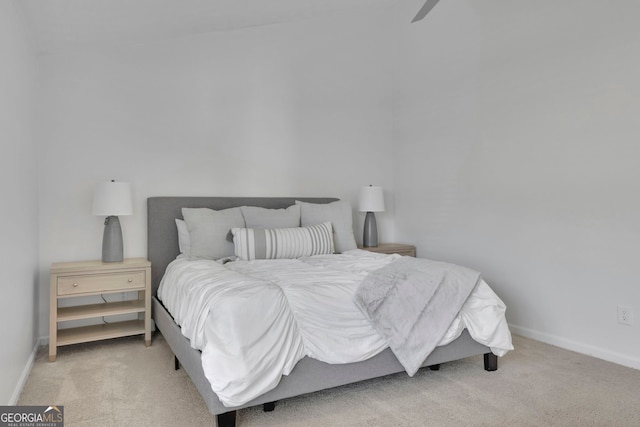 bedroom with carpet flooring, baseboards, and ceiling fan