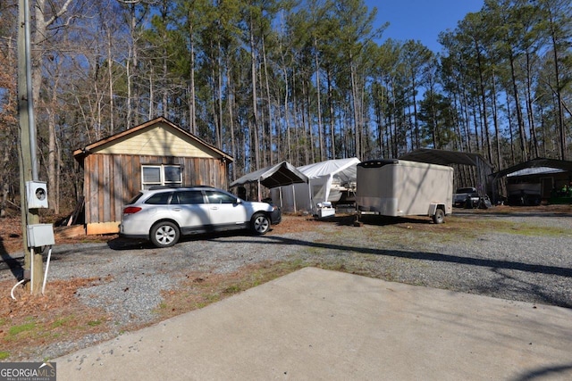 view of yard with a carport