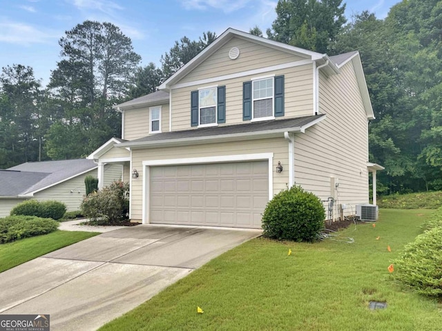 view of front of property featuring a front lawn, an attached garage, central AC, and driveway