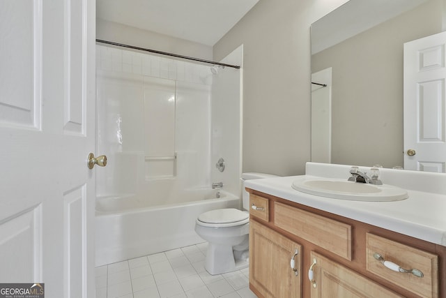 bathroom with vanity, tile patterned floors, toilet, and  shower combination