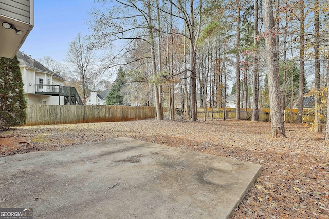 view of yard with a fenced backyard and a patio area