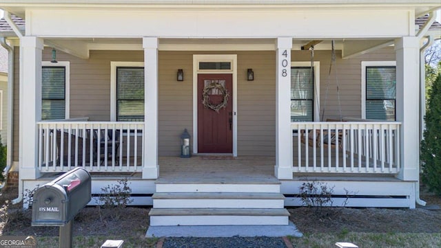 408 Davis St, Monroe, GA 30655 - entrance to property with a porch