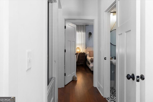 408 Davis St, Monroe, GA 30655 - corridor with dark wood-style floors