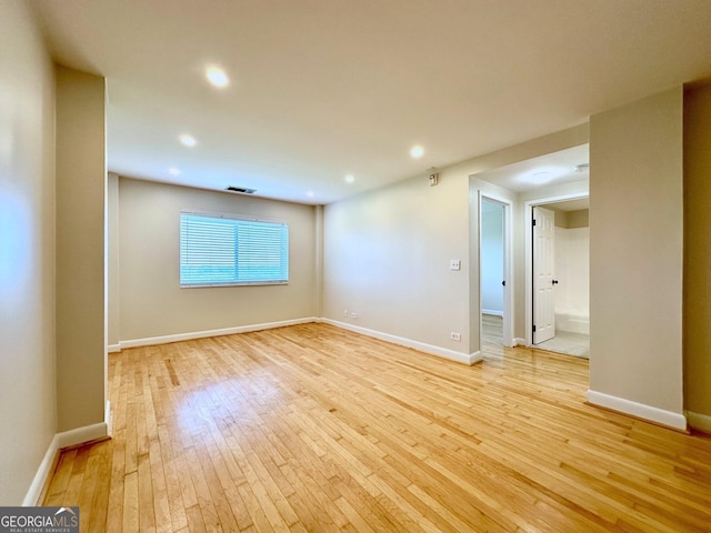 empty room featuring recessed lighting, visible vents, baseboards, and light wood-style flooring