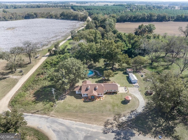 bird's eye view with a water view and a rural view