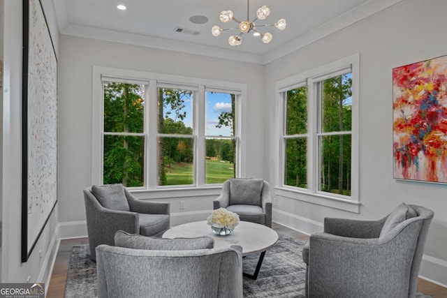 sunroom with a chandelier and visible vents