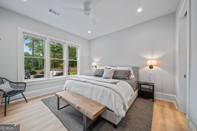 bedroom with recessed lighting, visible vents, baseboards, and light wood-style flooring