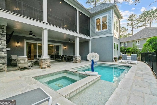 back of property featuring stucco siding, a patio, ceiling fan, and fence