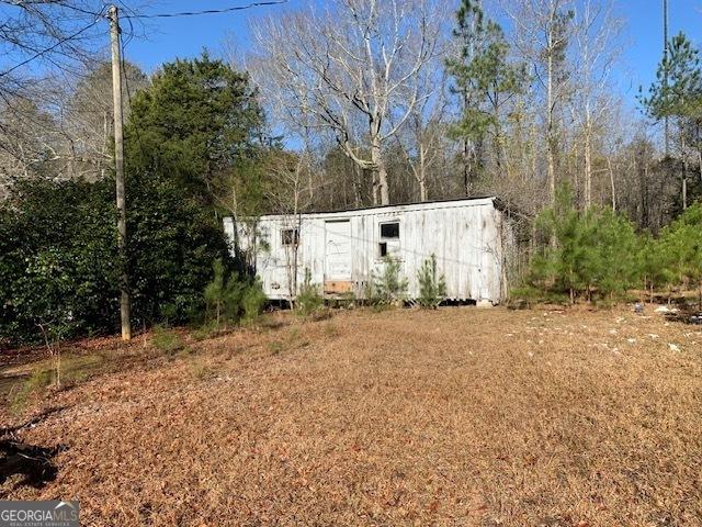 view of outdoor structure featuring an outbuilding