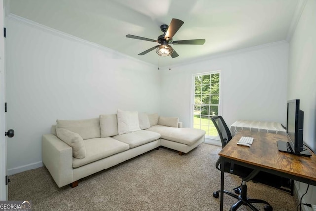 office space featuring baseboards, crown molding, a ceiling fan, and carpet floors