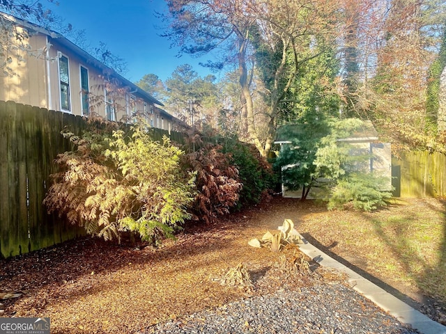 view of yard featuring fence