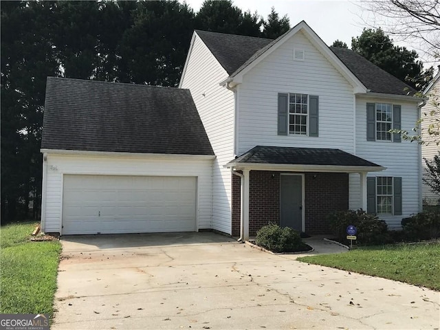 traditional-style house with a garage, brick siding, driveway, and roof with shingles