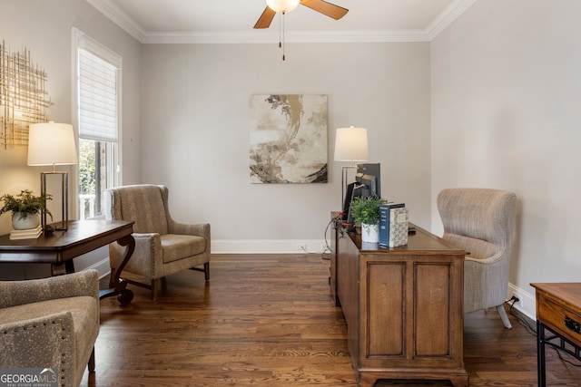 sitting room featuring baseboards, a ceiling fan, ornamental molding, and dark wood-style flooring