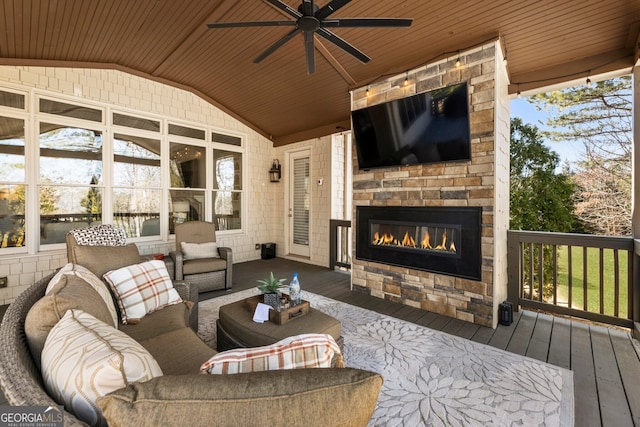 exterior space with lofted ceiling, hardwood / wood-style flooring, a ceiling fan, and wooden ceiling