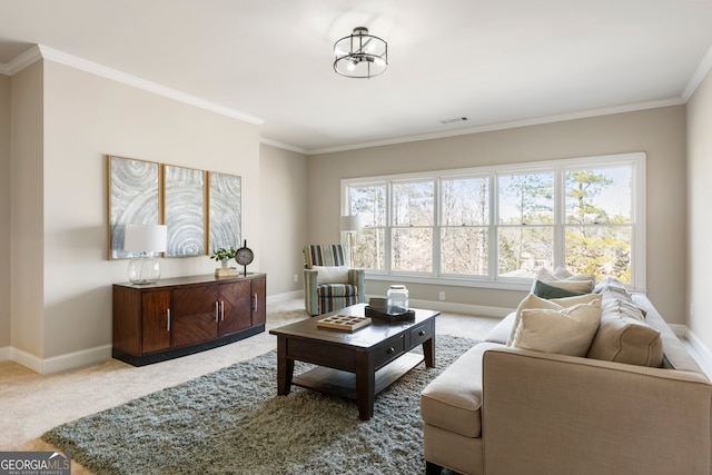 living area featuring visible vents, carpet floors, baseboards, and crown molding