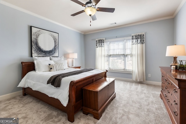 bedroom featuring baseboards, light colored carpet, and crown molding