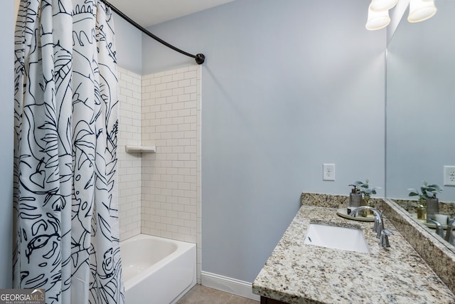 full bathroom with tile patterned floors, vanity, shower / tub combo, and baseboards