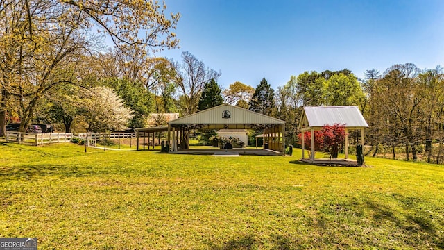 view of yard featuring a gazebo and fence