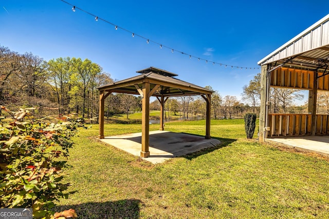 view of yard with a gazebo and a patio