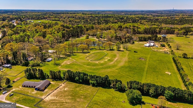 aerial view featuring a view of trees