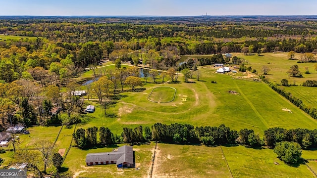 aerial view with a view of trees and a water view