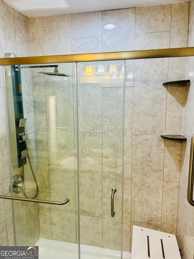 full bathroom with a stall shower