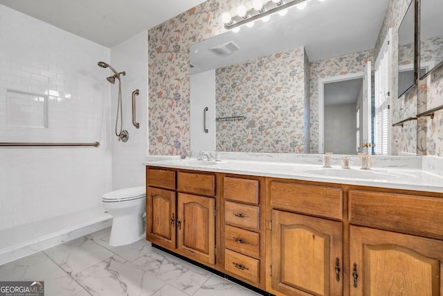 full bath featuring toilet, visible vents, marble finish floor, and a sink