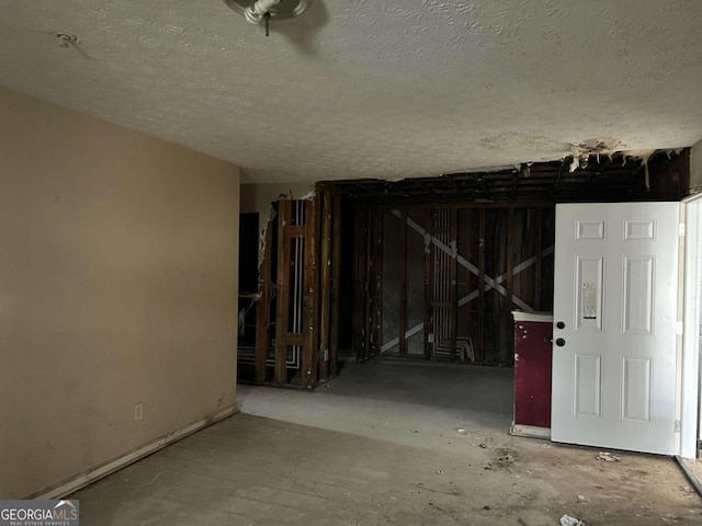 miscellaneous room featuring a textured ceiling