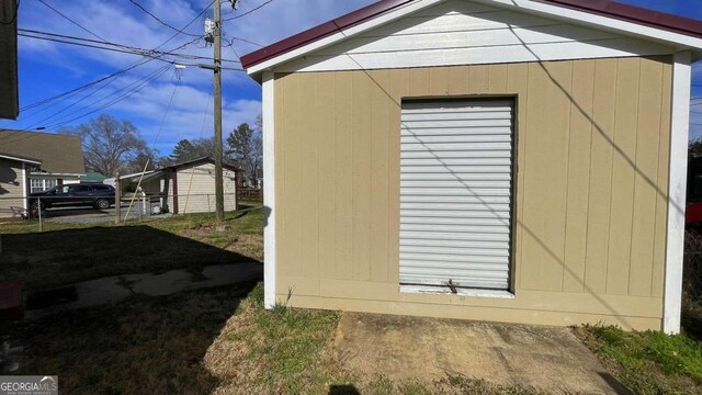 back of property featuring crawl space and a sunroom