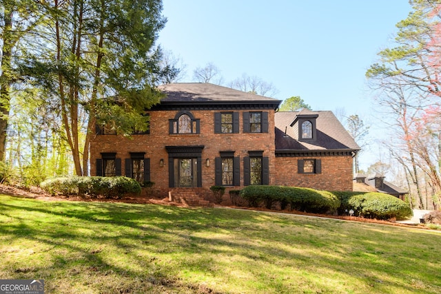 1435 Jay Ct, Snellville, GA 30078 - view of front of home featuring brick siding and a front lawn