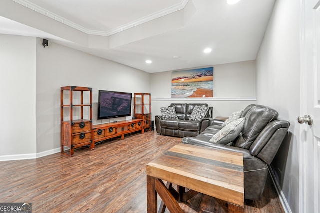 living area with recessed lighting, ornamental molding, baseboards, and wood finished floors