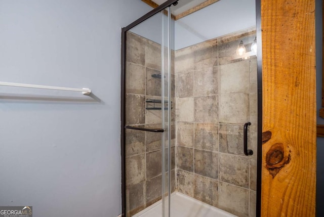 full bathroom with a shower stall