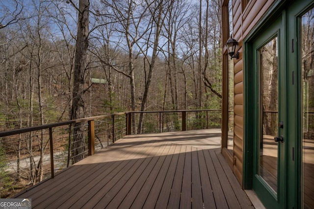 deck with a forest view